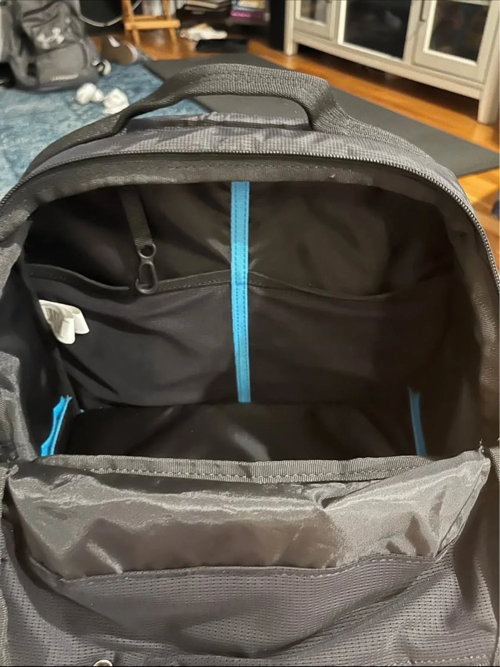 Thule Black Backpack with Blue Accent Zippers